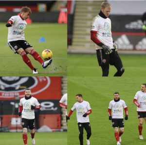 Football players wearing custom printed promotional T-Shirts